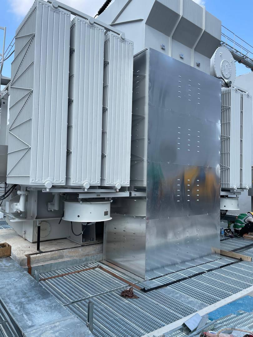 Close view of the sunshield panels beside the radiators