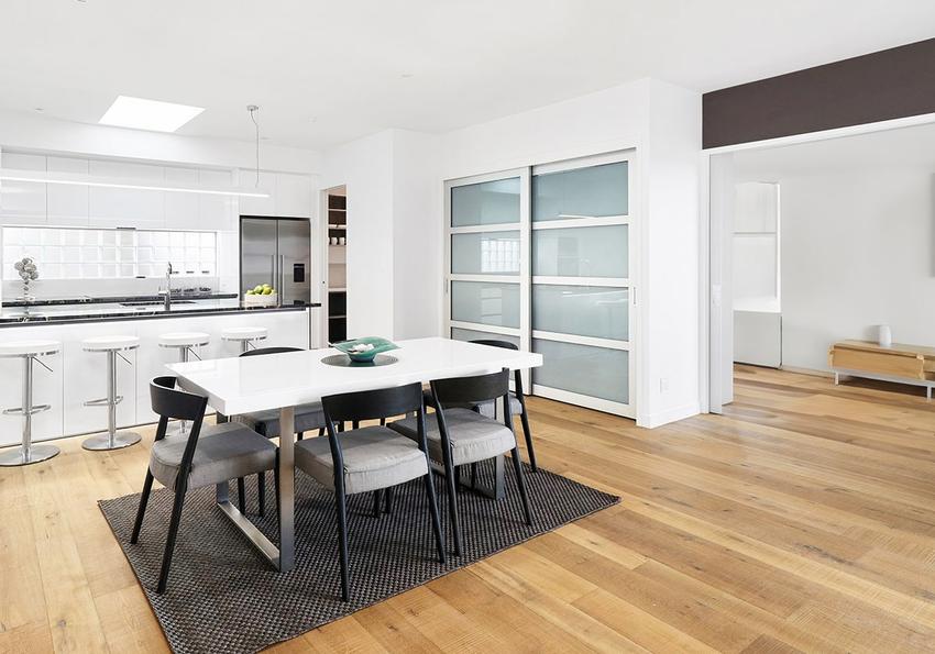 Modern contemporary dining room featuring several CS Cavity Slider products.