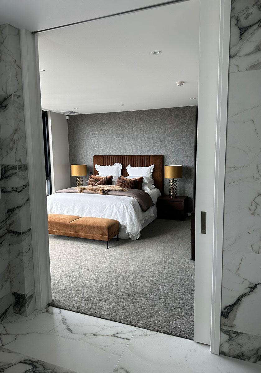 Custom CS TimberFormed Cavity Slider in a Modern Bedroom