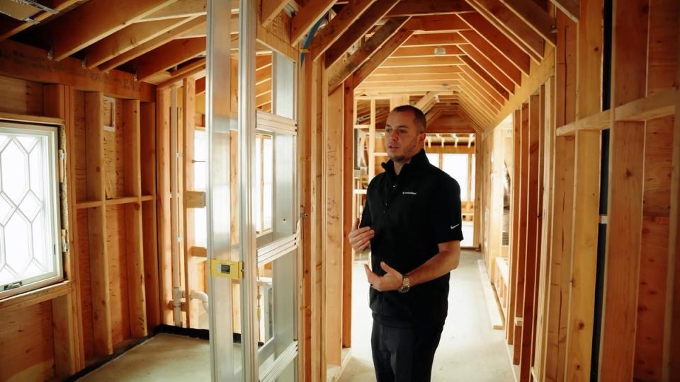Steve Crawford explaining the CS Ultimate Pocket Door Frame in Long Island Coastal Home