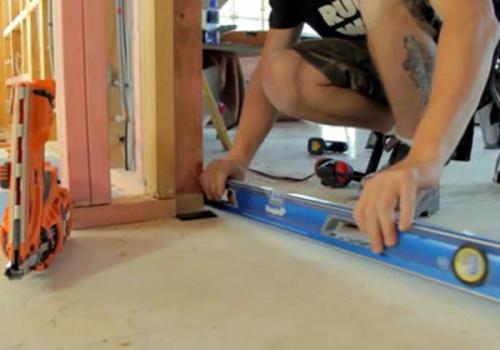 Man installing cavity slider