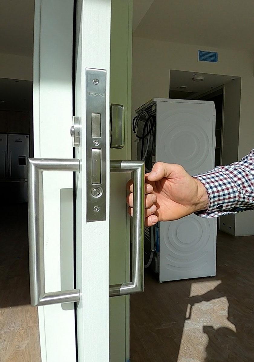 Builder showing ADA requirements for door handle