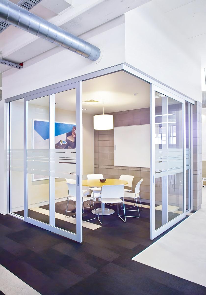 Corner meeting doors on CS Partition-TopMountTrack in an office conference room