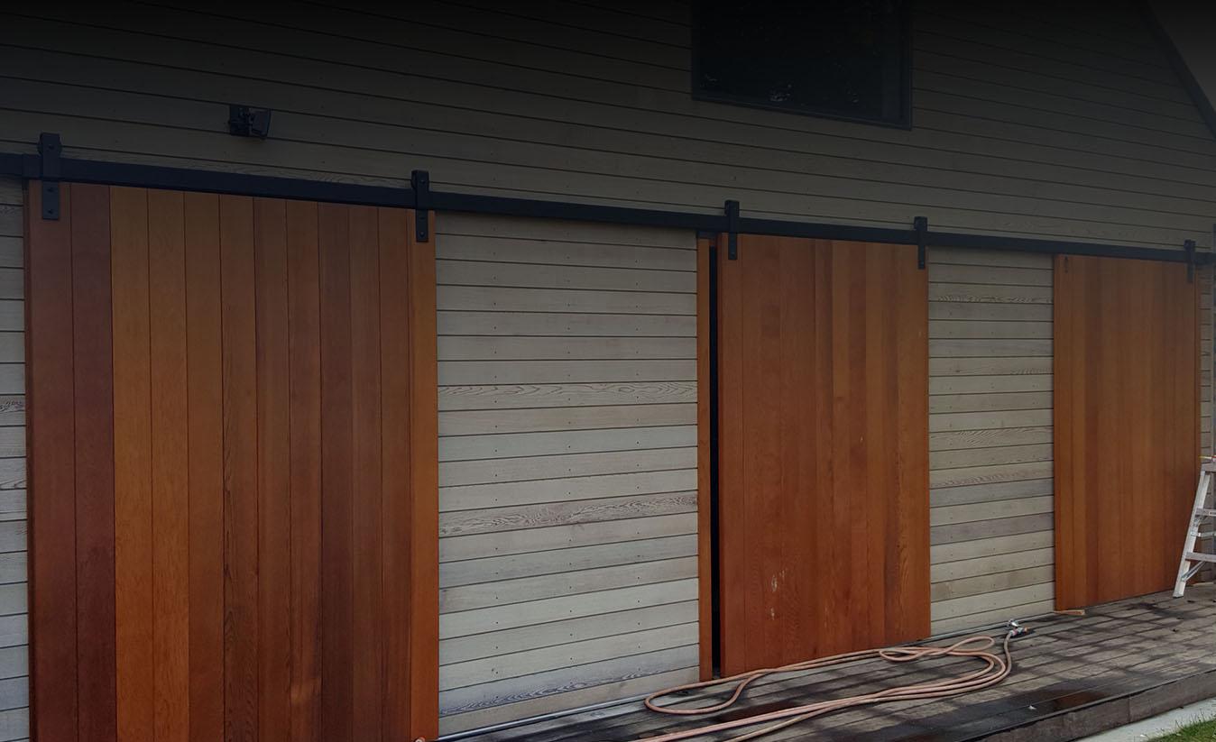 CS BarnDoor Tracks on exterior of Lodge CS BarnDoor Tracks on exterior of Lodge