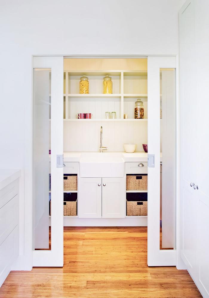 Bi-Parting Pocket Door in a Kitchen Pantry Bi-Parting Pocket Door in a Kitchen Pantry