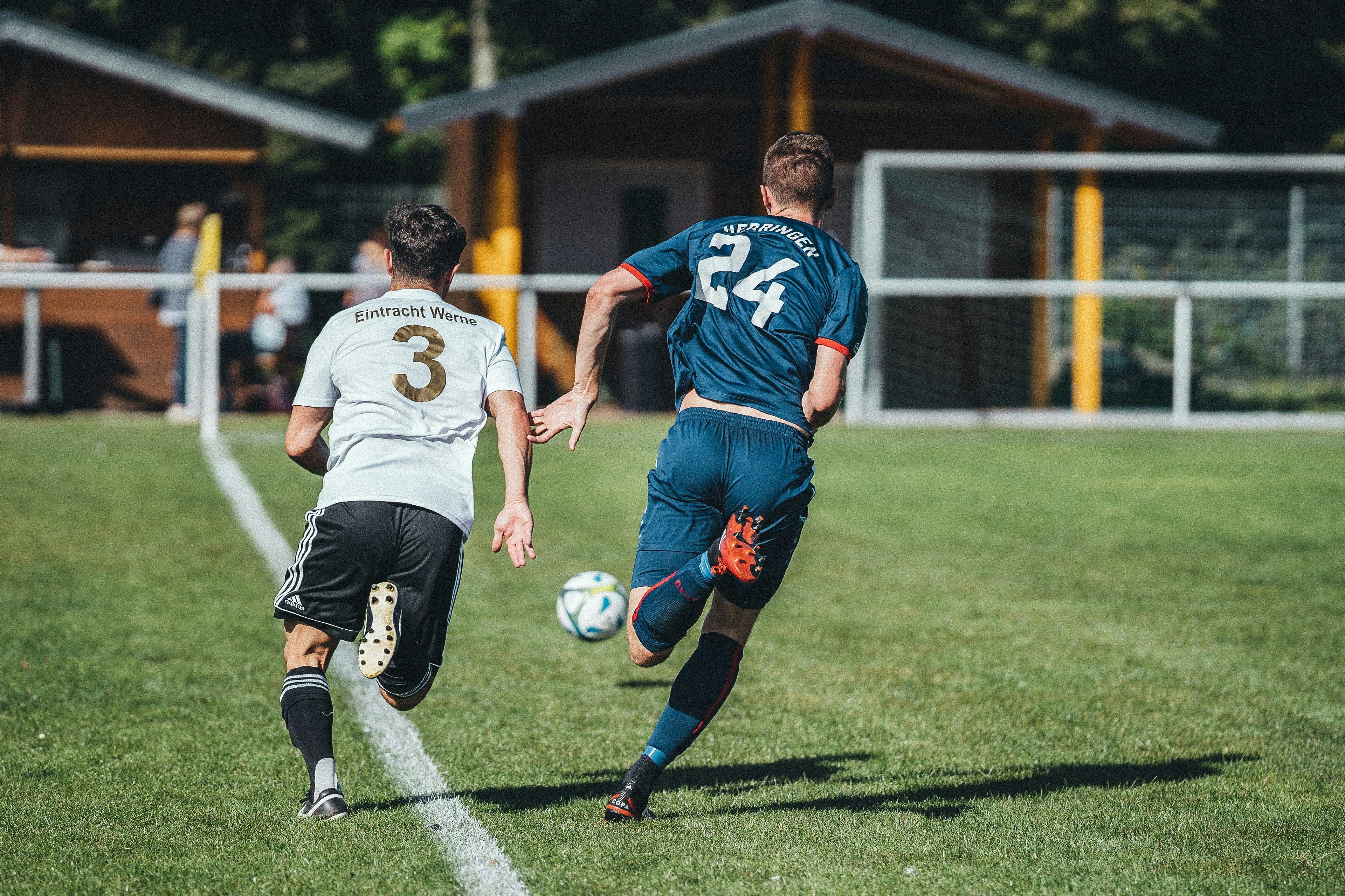 Student-athletes sprinting during a football match