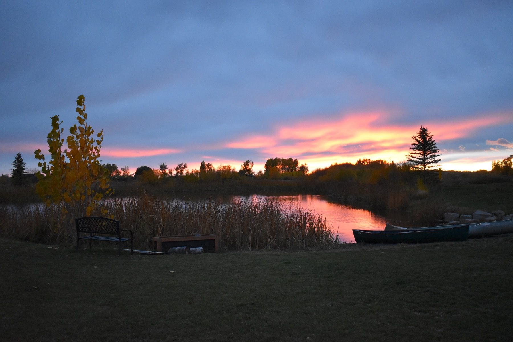 Pond and ceremony grounds at Three Peaks