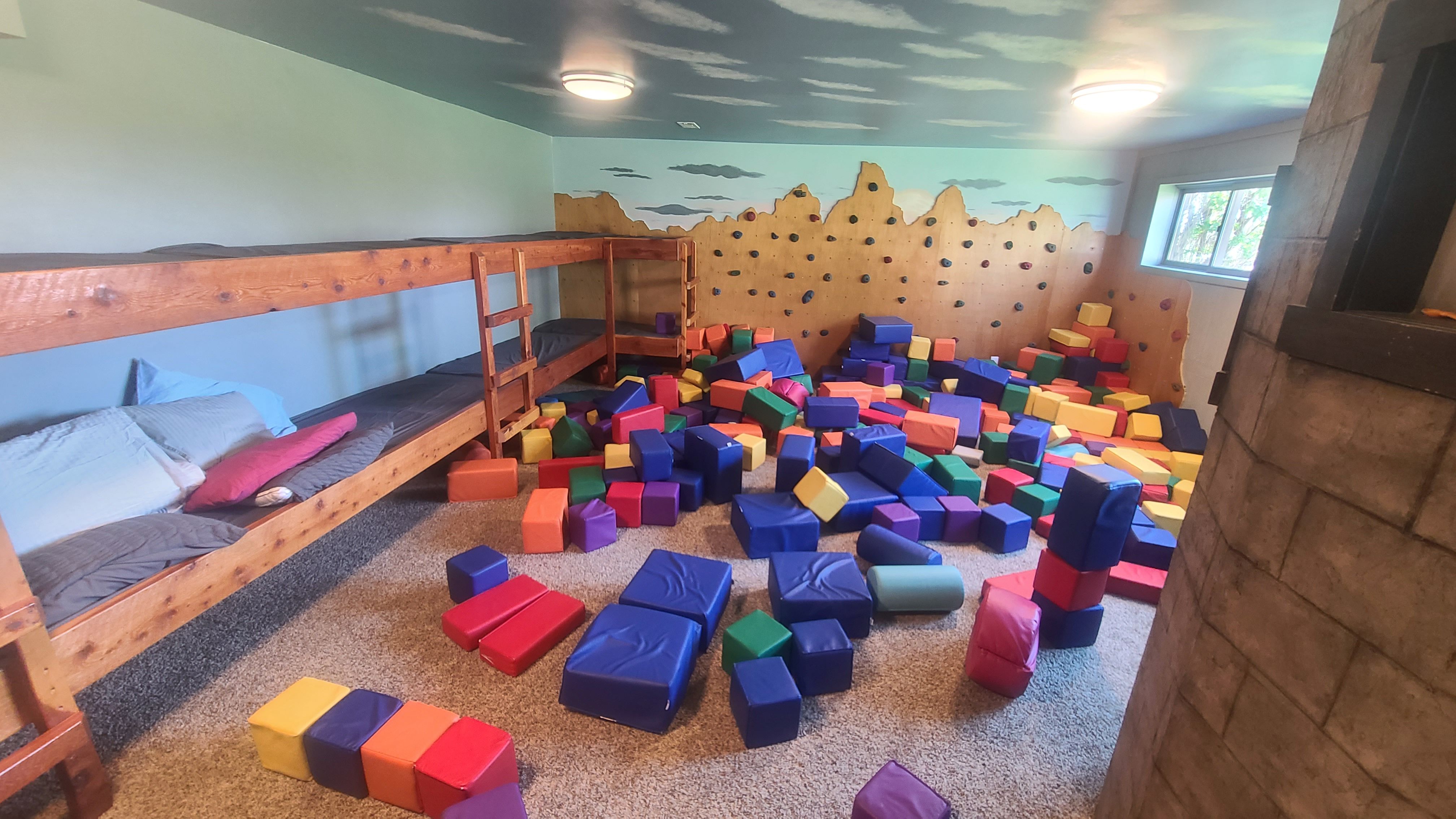 Kids playing in an enclosed playroom