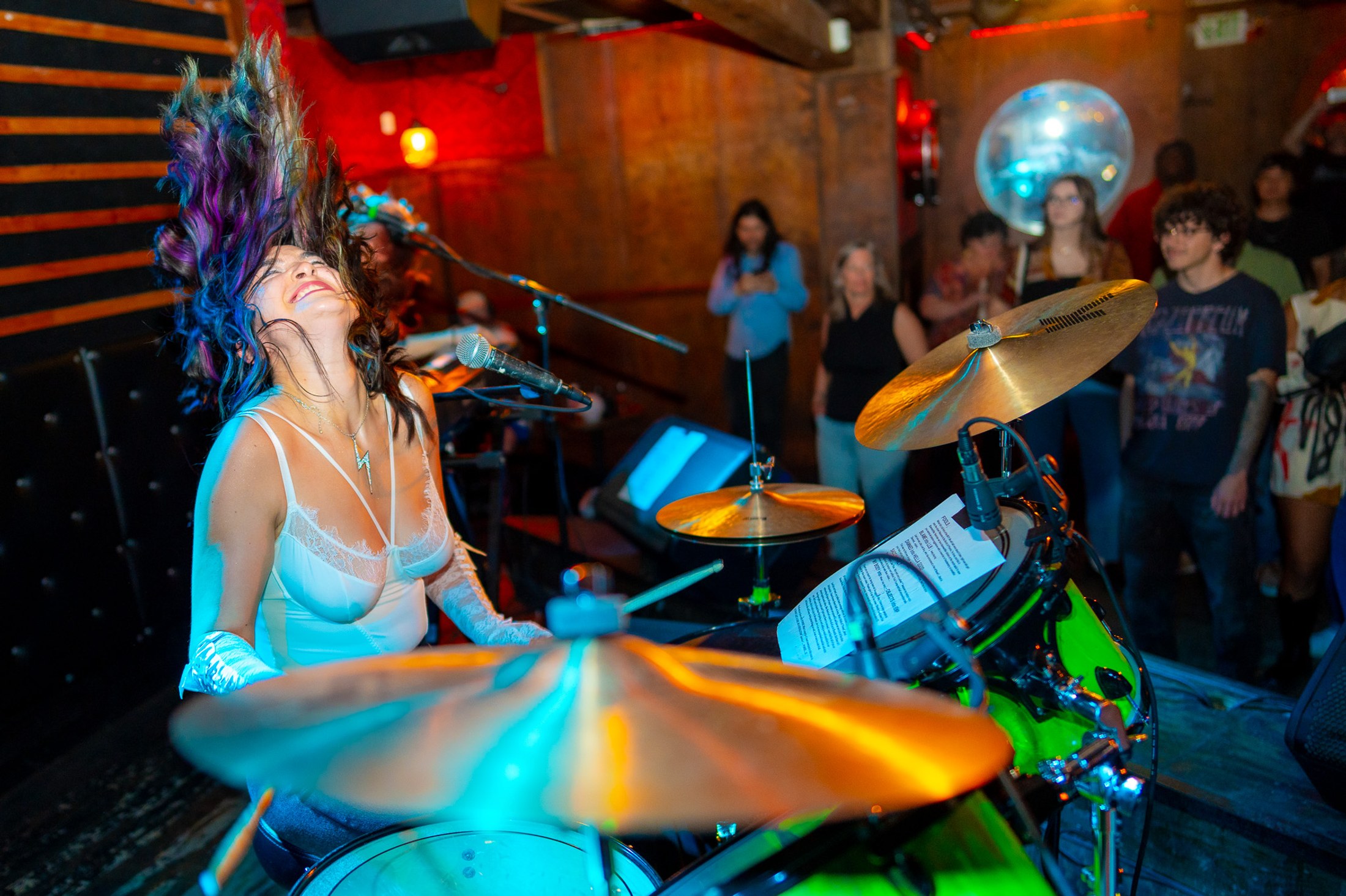 Prismia performing with her hair in motion