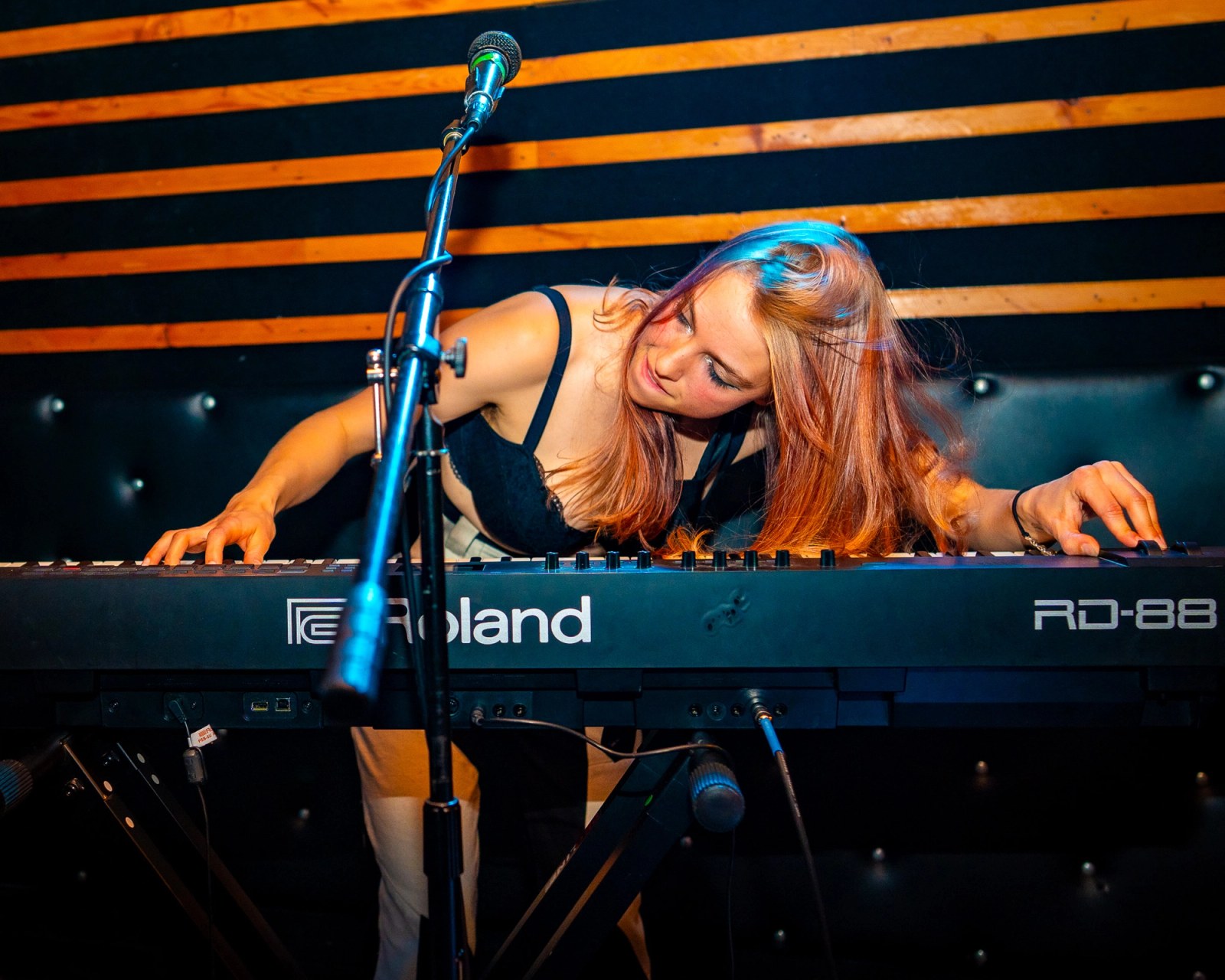 Rae performing on keyboards
