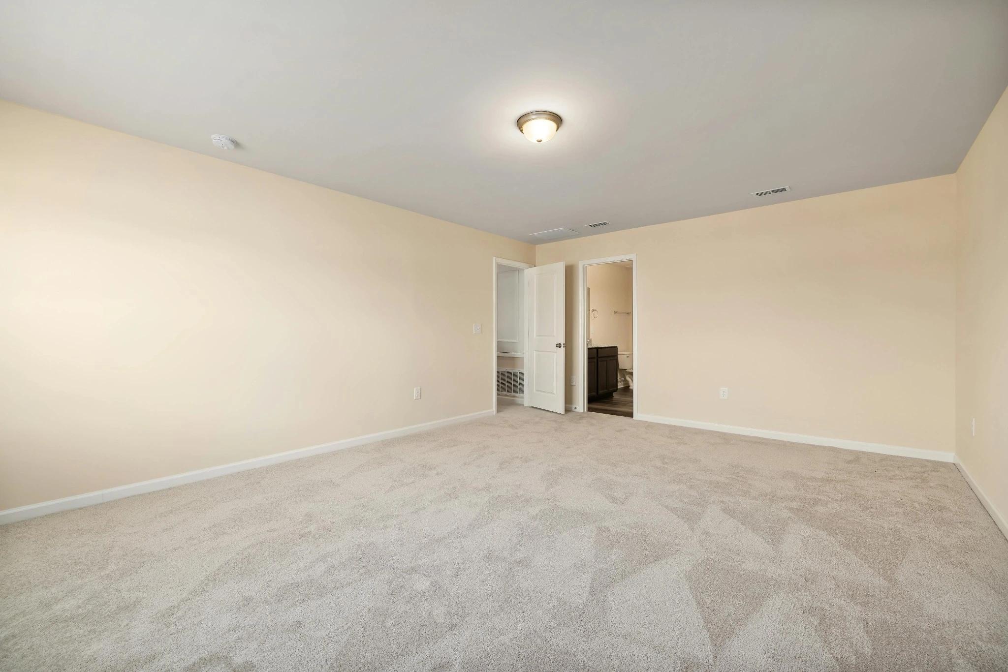 Bedroom carpet with professional vacuum lines after cleaning