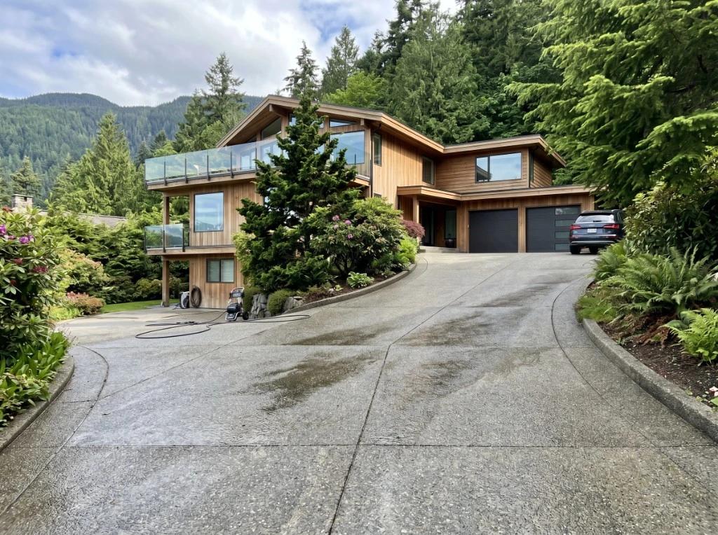 Residential concrete driveway and modern home exterior cleaning North Vancouver