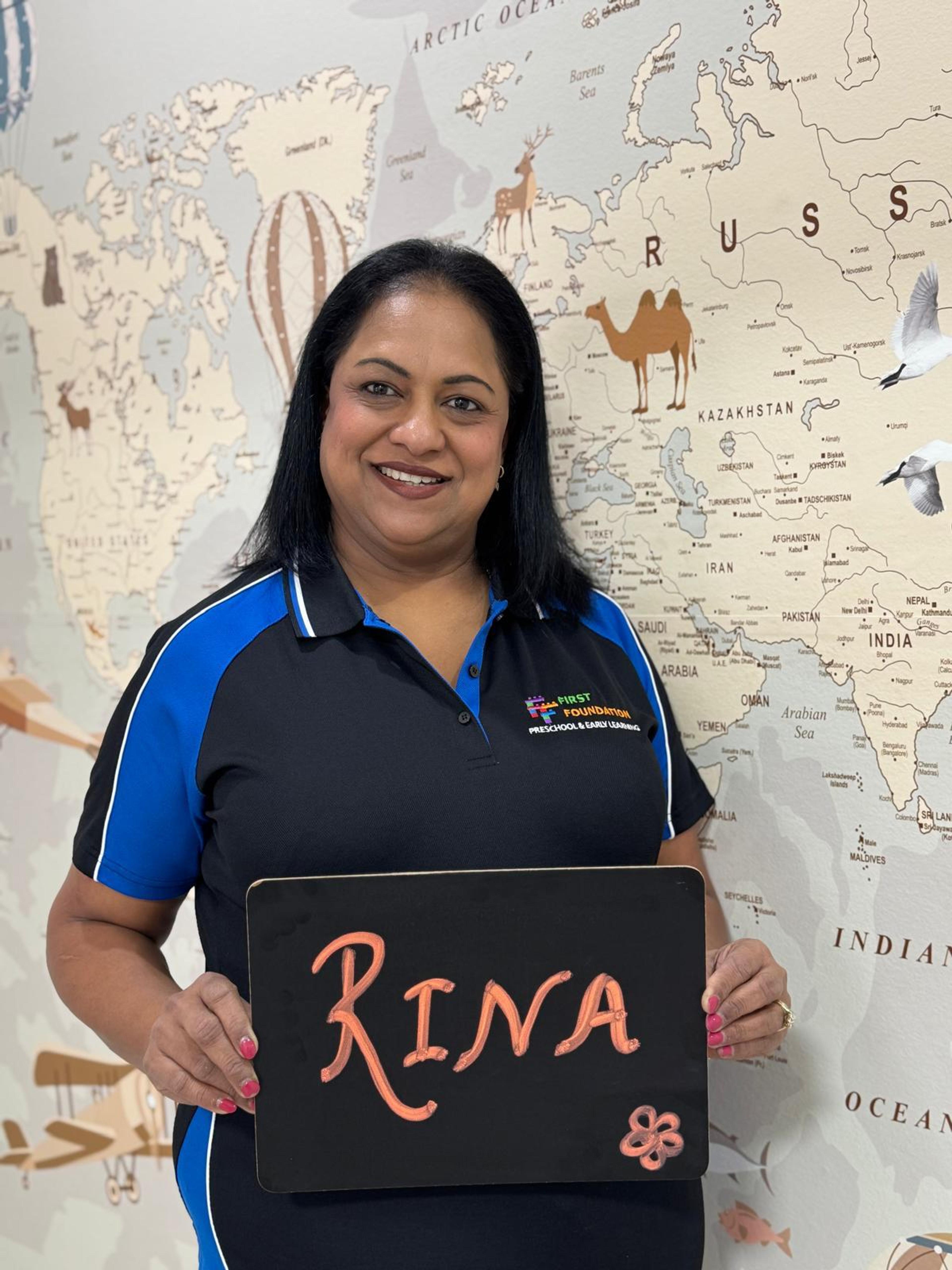 Rina, Educator
