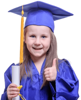 A proud preschool graduate at First Foundation