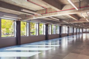 DSDHA The Hickman Retrofit First Floor with a green view toward Altab Ali Park and exposed concrete soffit