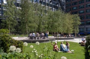 Exchange square in summer with groups taking pictures