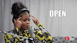 Think+Third+Eye+GIF+by+Girl+I+Guess+Pod.gif A woman with headphones points to her head at a podcast microphone, captioned 'Open your mind.'