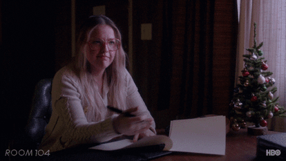 Hbo+GIF+by+Room104.gif A woman at a desk beside a Christmas tree says 'Let's just agree to disagree.'