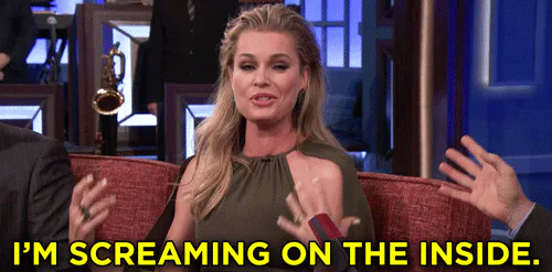 Animated reaction: Excited Rebecca Romijn