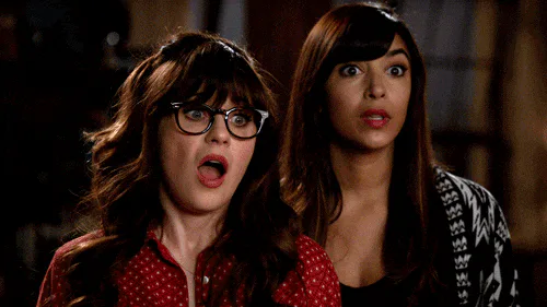 Animated reaction: Awkward Zooey Deschanel