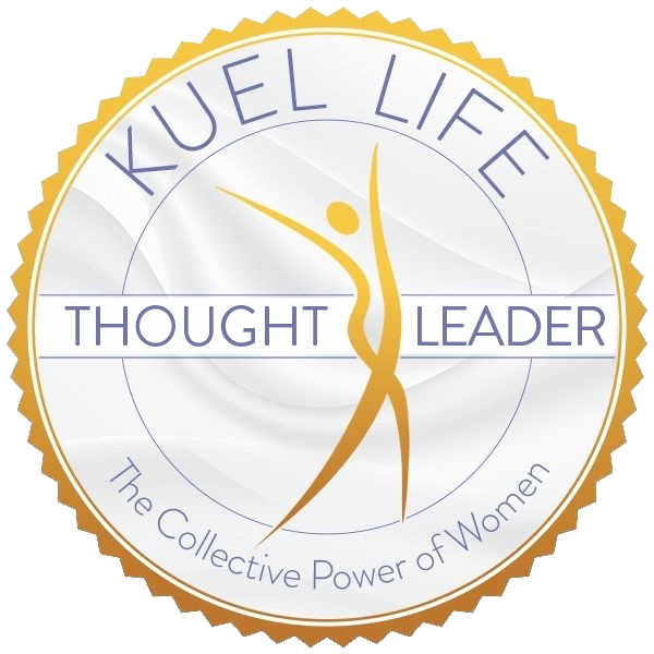 A circular emblem with a gold border, featuring a stylized human figure with outstretched arms and legs. The text on the emblem reads 'KUEL LIFE' at the top, 'THOUGHT LEADER' across the middle, and 'The Collective Power of Women' at the bottom.
