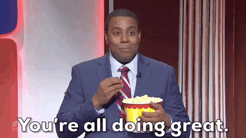 Kenan+Thompson+Popcorn+GIF+by+Saturday+Night+Live.gif A man in a suit eats popcorn and says 'You're all doing great.'