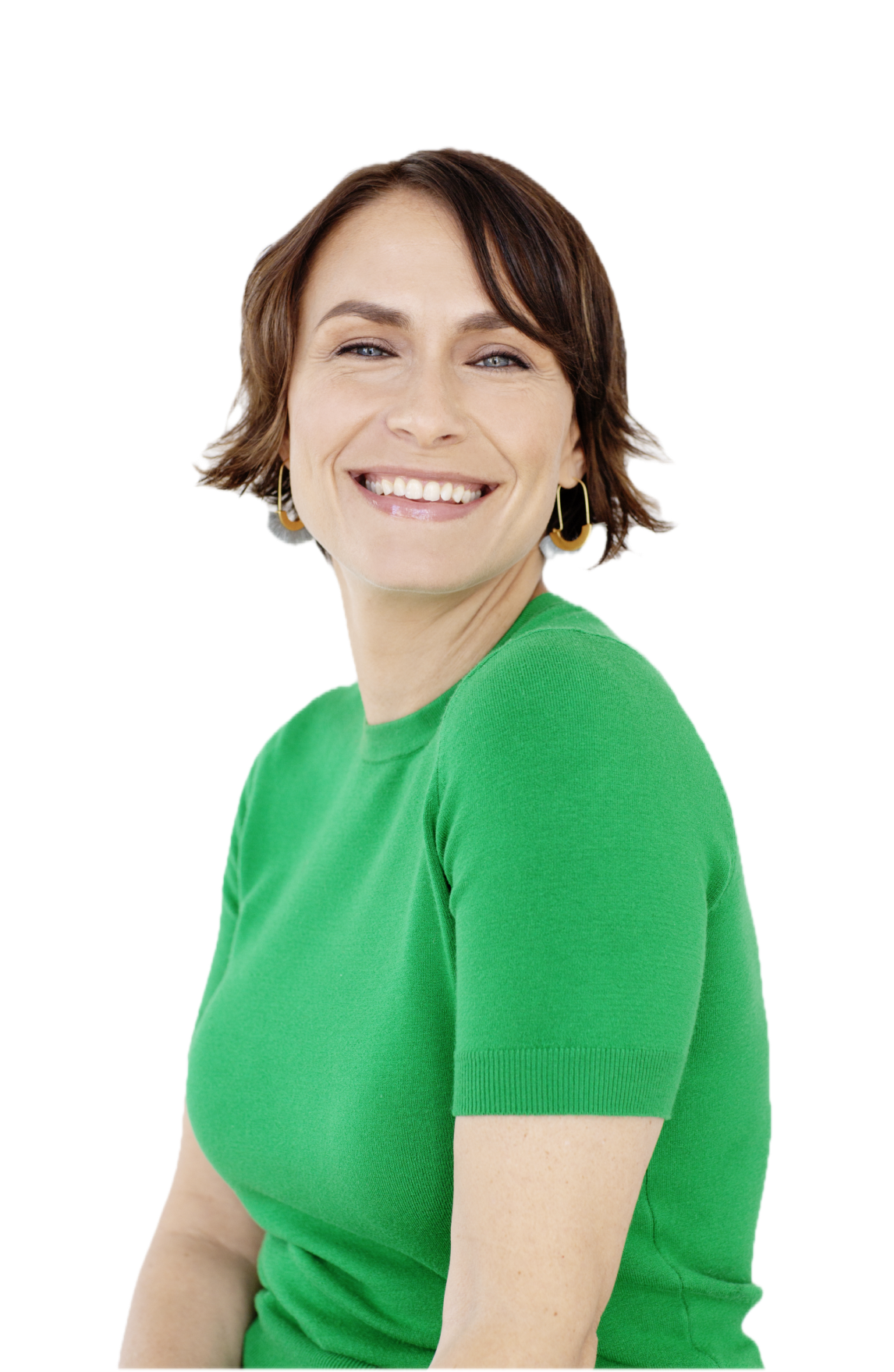 Image-7.png Person smiling, wearing a green shirt and hoop earrings against a white background.