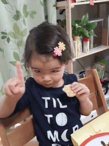 A toddler girl with a flower hair clip holds a snack and points sternly, wearing a shirt reading 'Til to moon.'​​​​‌﻿‍﻿​‍​‍‌‍﻿﻿‌﻿​‍‌‍‍‌‌‍‌﻿‌‍‍‌‌‍﻿‍​‍​‍​﻿‍‍​‍​‍‌﻿​﻿‌‍​‌‌‍﻿‍‌‍‍‌‌﻿‌​‌﻿‍‌​‍﻿‍‌‍‍‌‌‍﻿﻿​‍​‍​‍﻿​​‍​‍‌‍‍​‌﻿​‍‌‍‌‌‌‍‌‍​‍​‍​﻿‍‍​‍​‍‌‍‍​‌﻿‌​‌﻿‌​‌﻿​​​﻿‍‍​‍﻿﻿​‍﻿﻿‌‍﻿​‌‍﻿﻿‌‍​﻿‌‍​‌‌‍﻿​‌‍‍​‌‍﻿﻿‌﻿​﻿‌﻿‌​​﻿‍‍​﻿​﻿​﻿​﻿​﻿​﻿​﻿​﻿​‍﻿﻿‌‍‍‌‌‍﻿‍‌﻿‌​‌‍‌‌‌‍﻿‍‌﻿‌​​‍﻿﻿‌‍‌‌‌‍‌​‌‍‍‌‌﻿‌​​‍﻿﻿‌‍﻿‌‌‍﻿﻿‌‍‌​‌‍‌‌​﻿﻿‌‌﻿​​‌﻿​‍‌‍‌‌‌﻿​﻿‌‍‌‌‌‍﻿‍‌﻿‌​‌‍​‌‌﻿‌​‌‍‍‌‌‍﻿﻿‌‍﻿‍​﻿‍﻿‌‍‍‌‌‍‌​​﻿﻿‌‌‍﻿‌‌‍‍‌‌‍‌﻿‌﻿​‍‌‍​‌‌﻿‌​‌‍‍‌‌‍﻿﻿‌‍﻿‍​‍﻿‍‌‍﻿‌‌‍‌‌‌‍‌​‌‍‍‌‌‍​‌​‍﻿‍​﻿​﻿​﻿​﻿​﻿‌‍​﻿‌‍​﻿​‌​﻿​‍​﻿‌‍‌‍​﻿​﻿​﻿​﻿​​‌‍‌‍​﻿‍‌​﻿‍‌‌‍​‍​﻿‌﻿‌‍‌‌​﻿‍‌​﻿‍‌​﻿​﻿​﻿​‍​﻿‍‌​﻿​﻿‌‍​﻿‌‍​‍‌‍‌‌​﻿​﻿‌‍​‌​﻿​‍​﻿​​‌‍​‌​﻿​‌‌‍‌​​﻿‍﻿‌﻿‌​‌﻿‍‌‌﻿​​‌‍‌‌​﻿﻿‌‌‍﻿‌‌‍‌‌‌‍‌​‌‍‍‌‌‍​‌‌​​‌‌﻿​﻿‌﻿​﻿‌‍‌‌‌﻿‌​​﻿‍﻿‌﻿​​‌‍​‌‌﻿‌​‌‍‍​​﻿﻿‌‌‍​‌‌‍﻿​‌﻿‌​​﻿﻿﻿‌‍​‍‌‍​‌‌﻿​﻿‌‍‌‌‌‌‌‌‌﻿​‍‌‍﻿​​﻿﻿‌‌‍‍​‌﻿‌​‌﻿‌​‌﻿​​​‍‌‌​﻿​﻿‌​​‌​‍‌‌​﻿​‍‌​‌‍​‍‌‌​﻿​‍‌​‌‍‌‍﻿​‌‍﻿﻿‌‍​﻿‌‍​‌‌‍﻿​‌‍‍​‌‍﻿﻿‌﻿​﻿‌﻿‌​​‍‌‌​﻿​﻿‌​​‌​﻿​﻿​﻿​﻿​﻿​﻿​﻿​﻿​‍‌‍‌‍‍‌‌‍‌​​﻿﻿‌‌‍﻿‌‌‍‍‌‌‍‌﻿‌﻿​‍‌‍​‌‌﻿‌​‌‍‍‌‌‍﻿﻿‌‍﻿‍​‍﻿‍‌‍﻿‌‌‍‌‌‌‍‌​‌‍‍‌‌‍​‌​‍﻿‍​﻿​﻿​﻿​﻿​﻿‌‍​﻿‌‍​﻿​‌​﻿​‍​﻿‌‍‌‍​﻿​﻿​﻿​﻿​​‌‍‌‍​﻿‍‌​﻿‍‌‌‍​‍​﻿‌﻿‌‍‌‌​﻿‍‌​﻿‍‌​﻿​﻿​﻿​‍​﻿‍‌​﻿​﻿‌‍​﻿‌‍​‍‌‍‌‌​﻿​﻿‌‍​‌​﻿​‍​﻿​​‌‍​‌​﻿​‌‌‍‌​​‍‌‍‌﻿‌​‌﻿‍‌‌﻿​​‌‍‌‌​﻿﻿‌‌‍﻿‌‌‍‌‌‌‍‌​‌‍‍‌‌‍​‌‌​​‌‌﻿​﻿‌﻿​﻿‌‍‌‌‌﻿‌​​‍‌‍‌﻿​​‌‍​‌‌﻿‌​‌‍‍​​﻿﻿‌‌‍​‌‌‍﻿​‌﻿‌​​‍‌‍‌﻿​​‌‍‌‌‌﻿​‍‌﻿​﻿‌﻿​​‌‍‌‌‌‍​﻿‌﻿‌​‌‍‍‌‌﻿‌‍‌‍‌‌​﻿﻿‌‌﻿​​‌﻿‌‌‌‍​‍‌‍﻿​‌‍‍‌‌﻿​﻿‌‍‍​‌‍‌‌‌‍‌​​‍​‍‌﻿﻿‌
