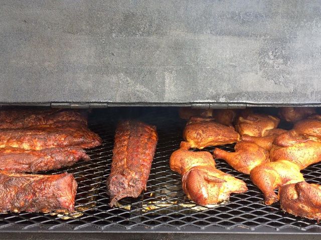 BBQ ribs and chicken on smoker