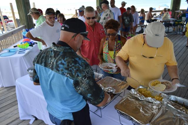 Steve serving food at gazebo