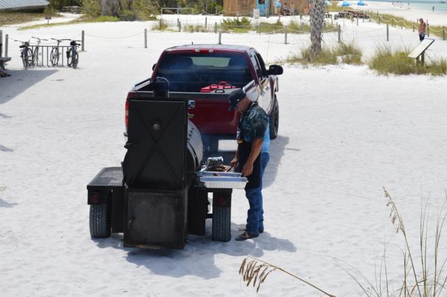 Steve with custom smoker on beach