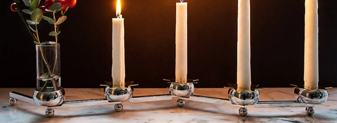 Ljusmanschetter i guld formade som stjärnor