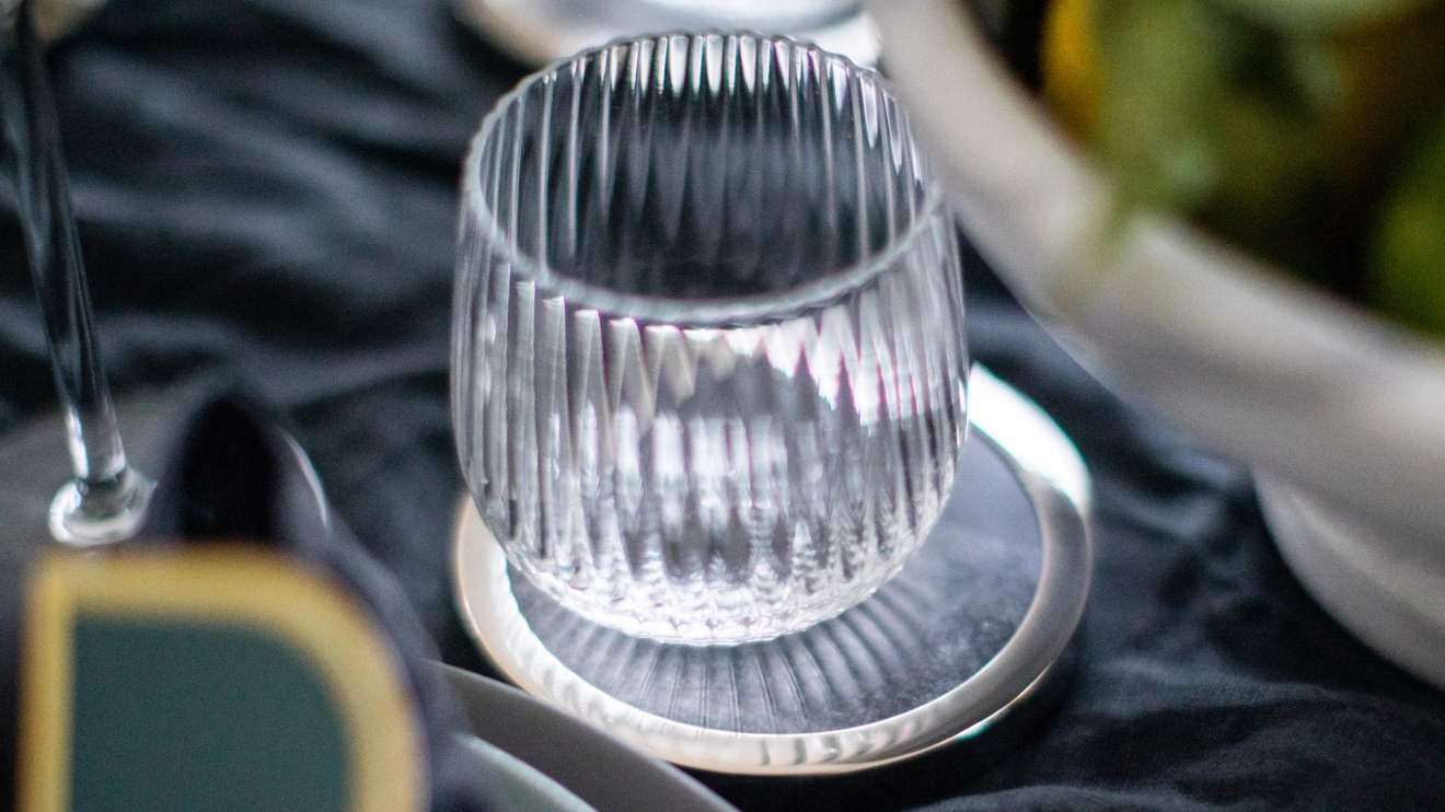 Glasunderlägg i silver