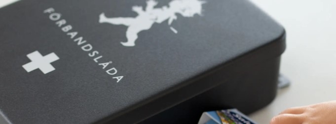 Förband, förbandslåda svart Solstickan