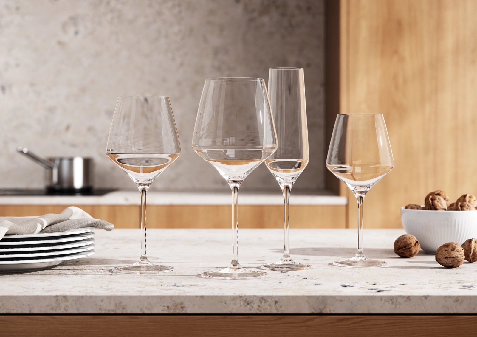 a group of wine glasses sitting on top of a counter .