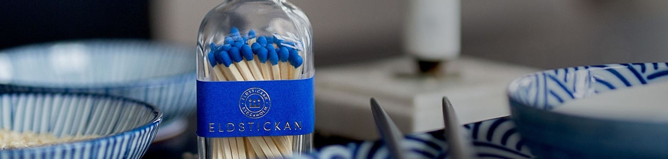 Eldstickan blå tändstickor 