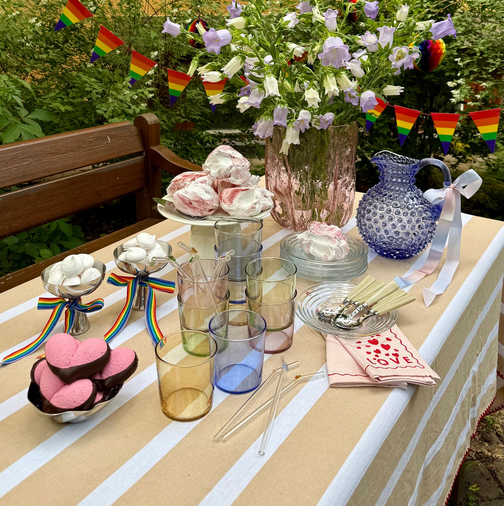 a table with a vase of flowers on it
