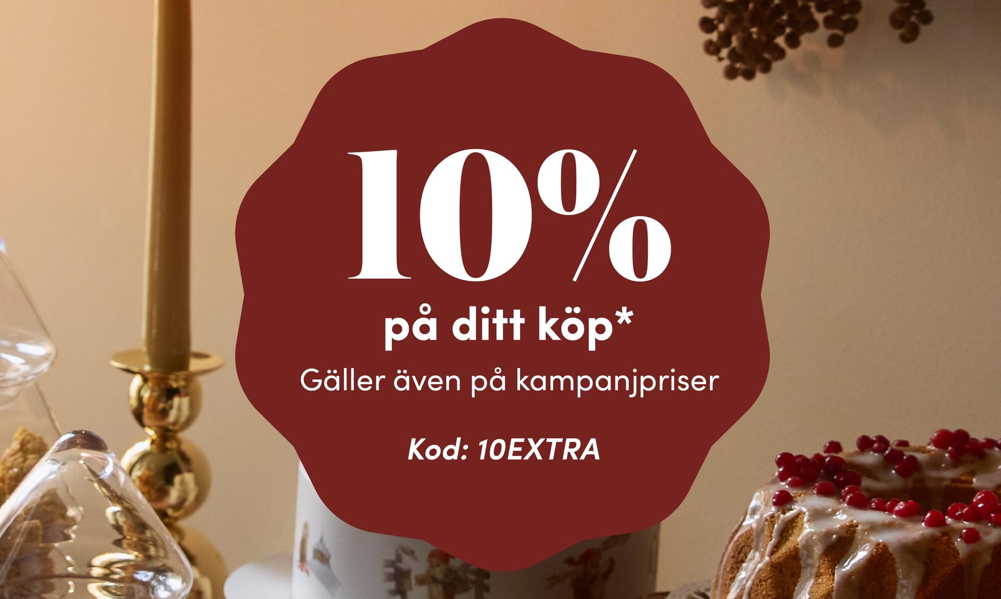 Christmas scene with an offer for 10% off your purchase, including sale prices, use code 10EXTRA.