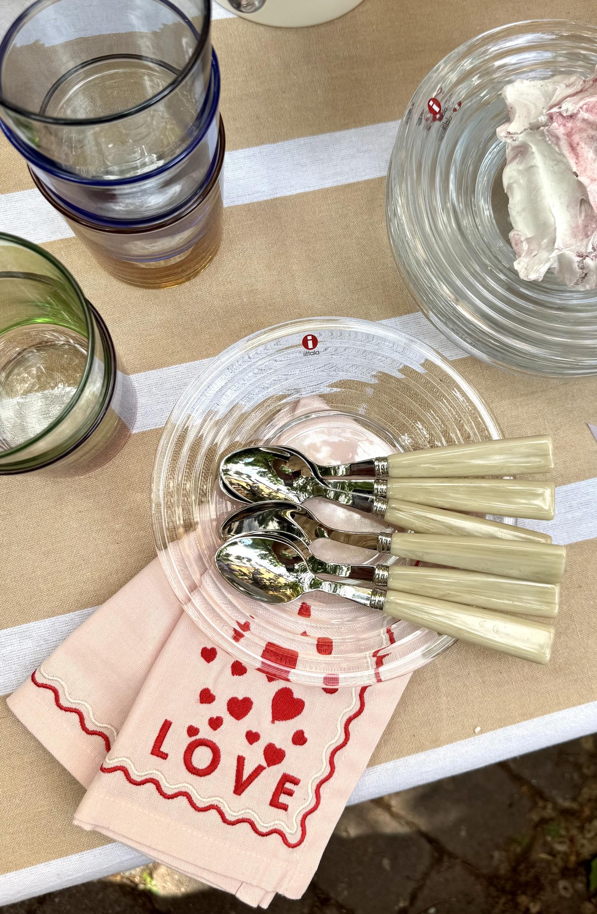 a napkin with hearts and the word love on it