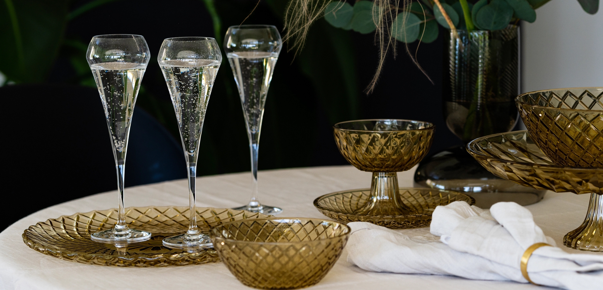Chef & Sommelier Open Up Champagneglass med rosa bobler på hvit duk