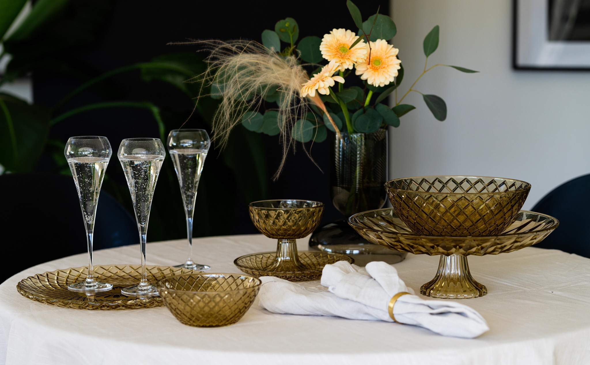 Chef & Sommelier Open Up Champagneglass med rosa bobler på hvit duk