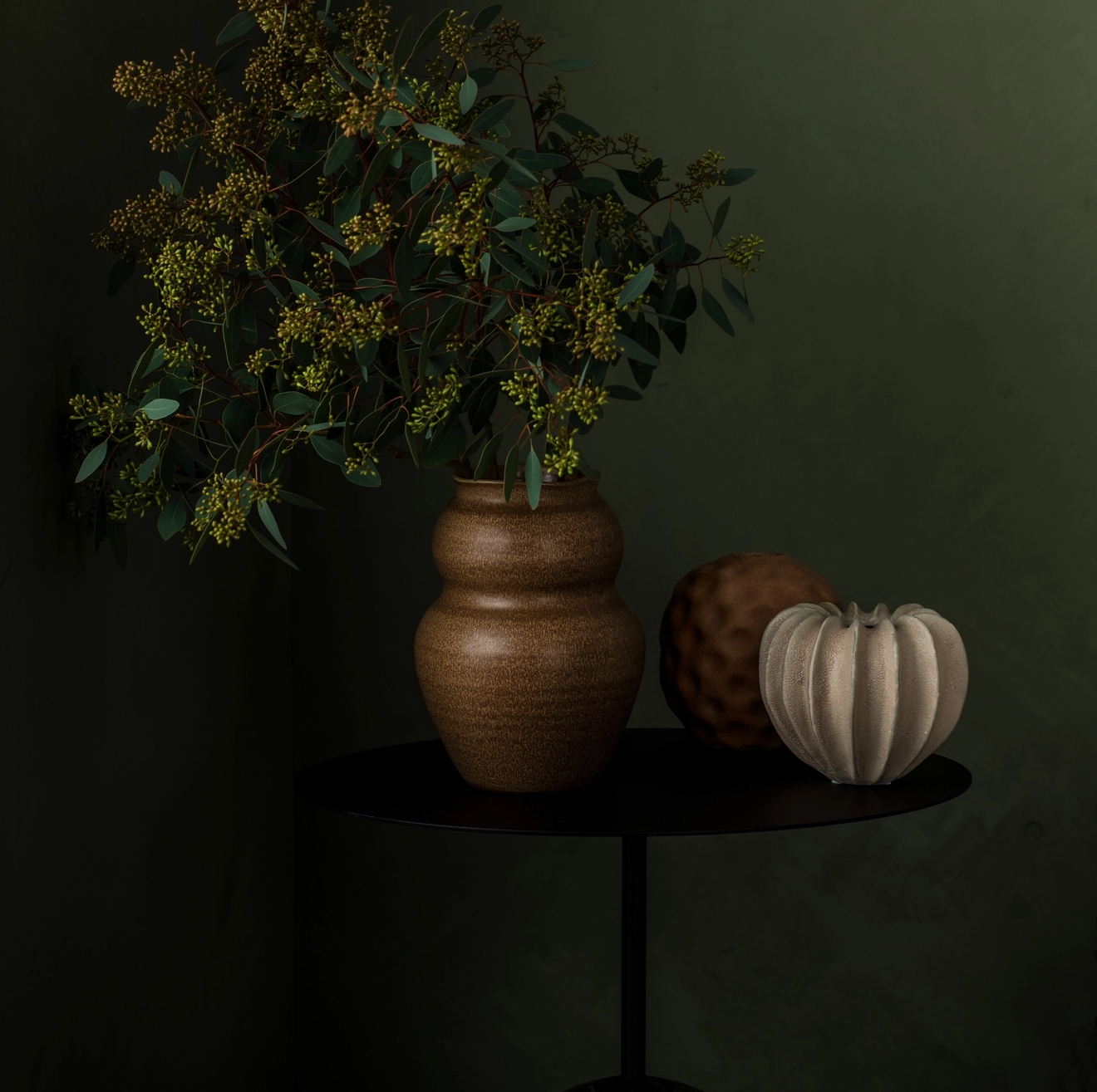 dark picture with brown vase