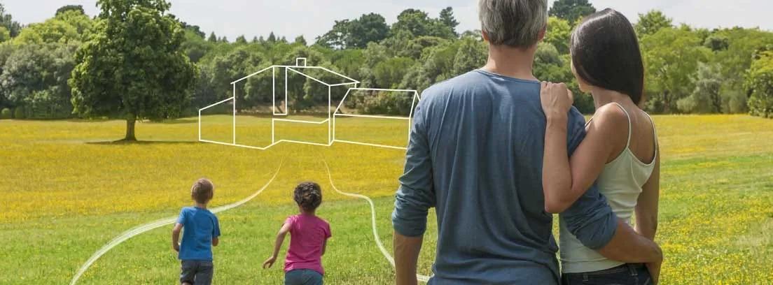 Família de costas olhando um terreno gramado com o desenho de uma casa em traço branco sobre a paisagem