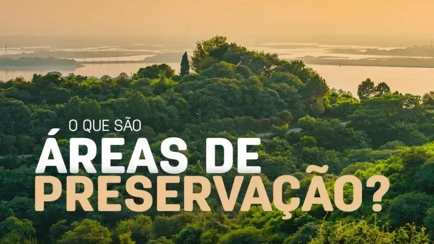 Paisagem com mata nativa e água ao fundo e o texto: O que são áreas de preservação?