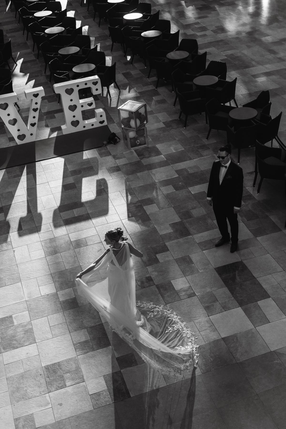 Overhead shot of LOVE marquee sign at wedding reception venue