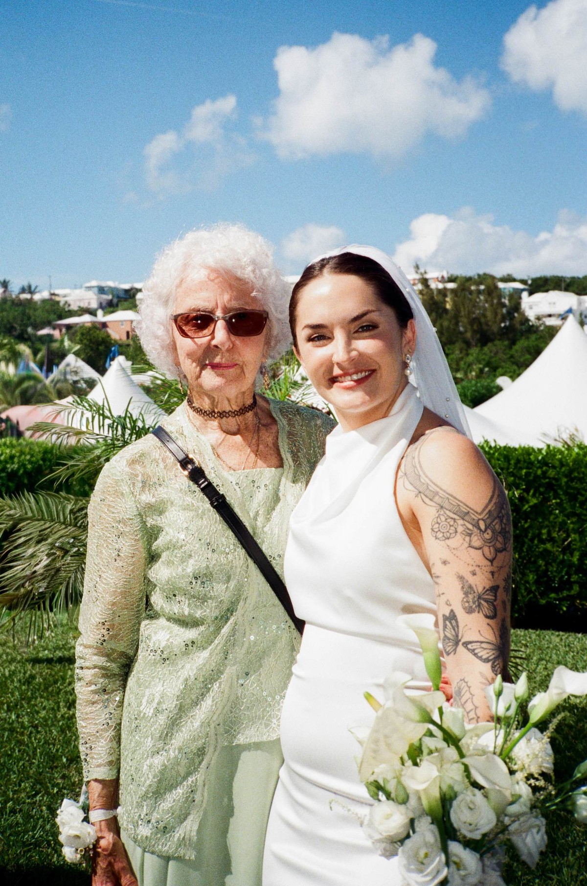 Bride with her grandmother after a Bermuda wedding ceremony, shot on film