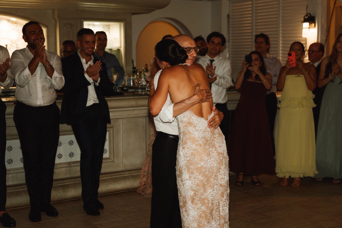 Bride embracing her father during their dance at Rosewood Bermuda