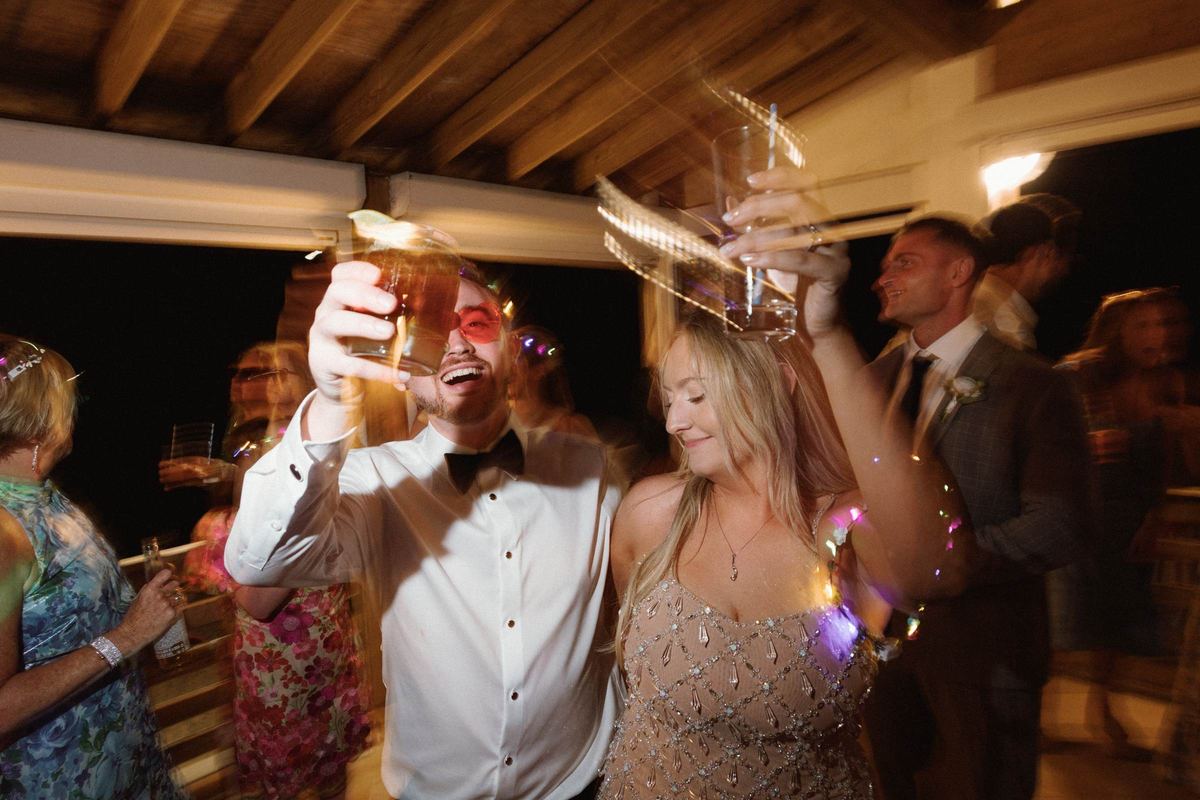 Cinematic flash photograph of late night dance floor at Bermuda wedding