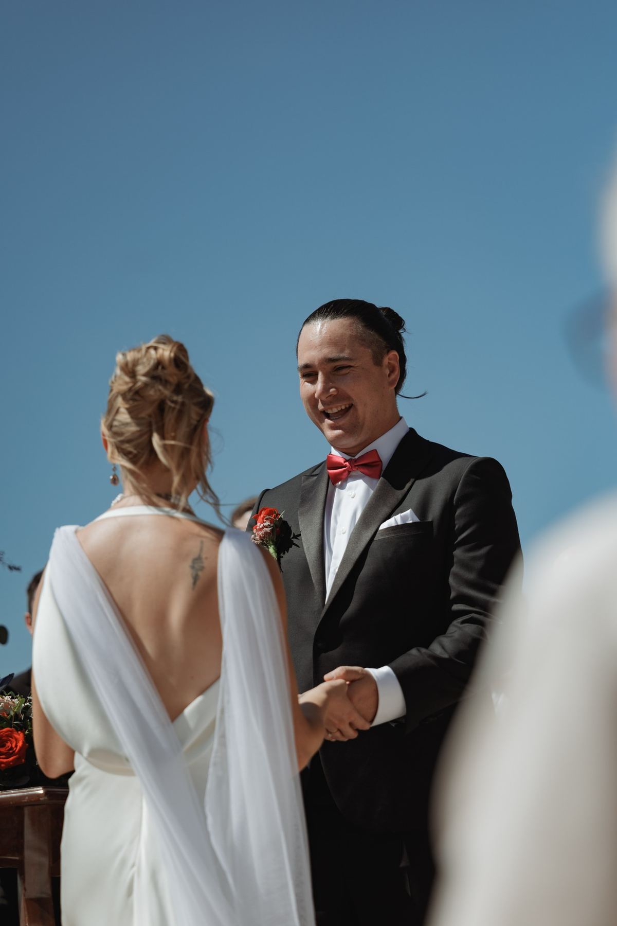 Candid emotional moment during wedding ceremony