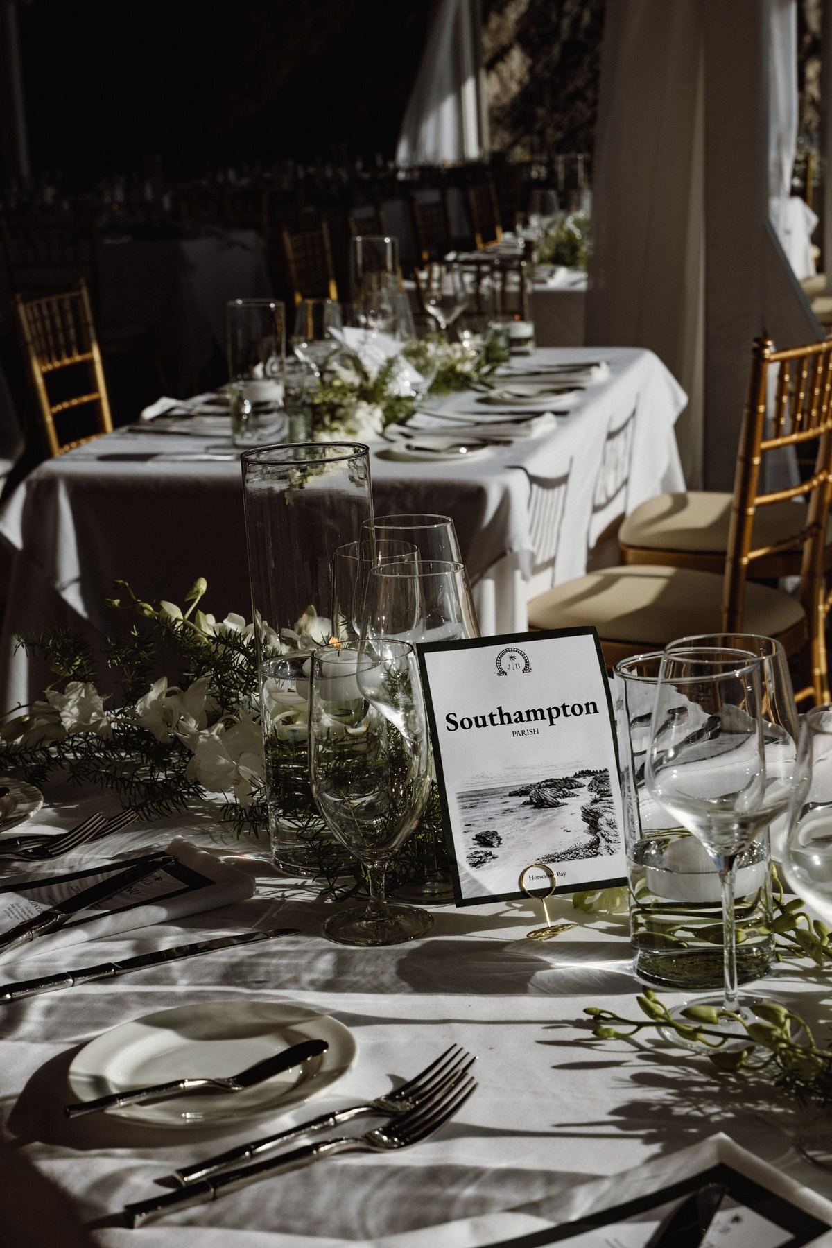 Detail tablescape with Southampton Parish table card at Bermuda wedding reception
